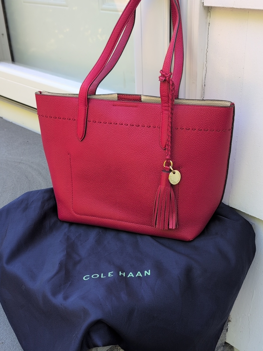 Cole Haan Red Pebbled Leather Shoulder Bag with Tassel Charm and Dust bag.  NWOT